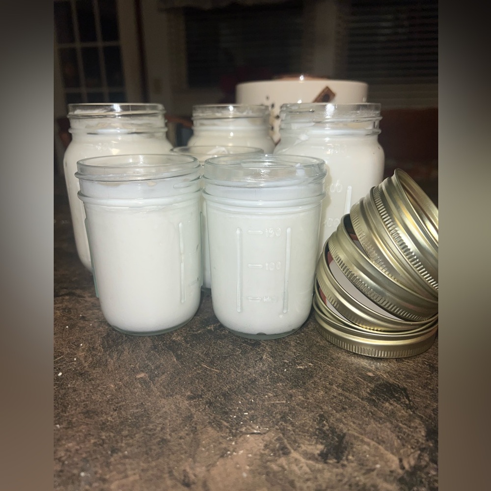 Homemade Shea Butter Lotion in small jars
